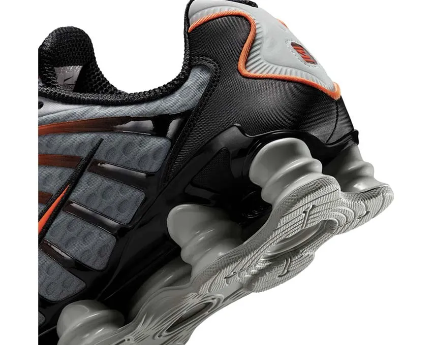 Nike Shox TL "Smoke Grey" running in a canal area shoes