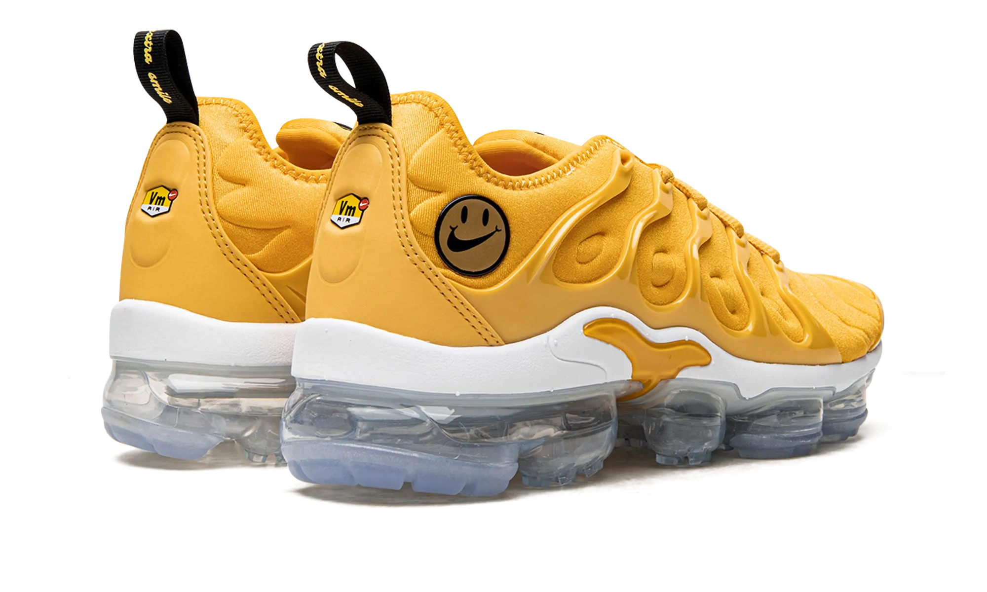 AIR VAPORMAX PLUS OMEN WMNS BreathableLining running in a neighborhood