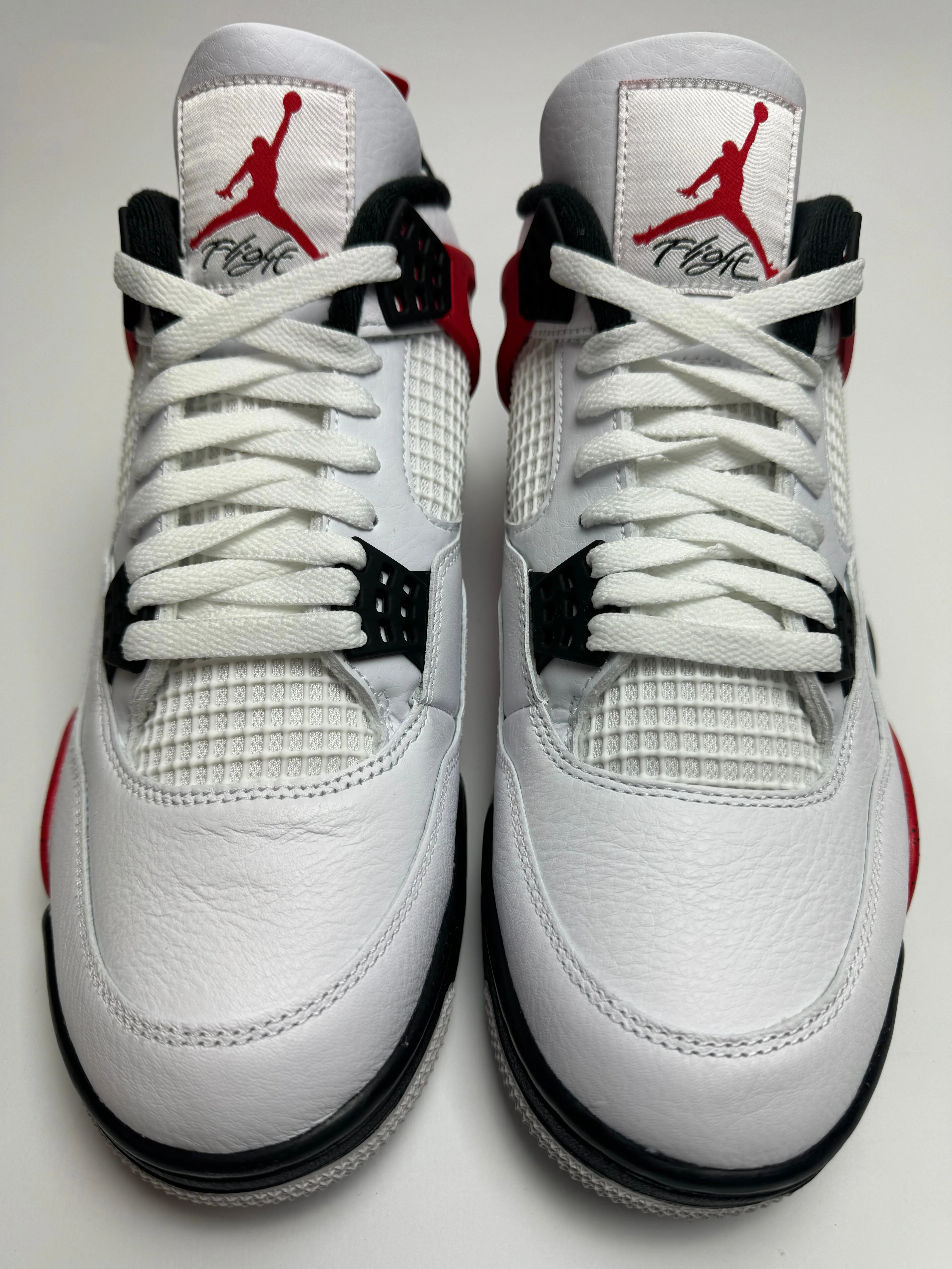 Air Jordan 4 "Red Cement" Metro Go