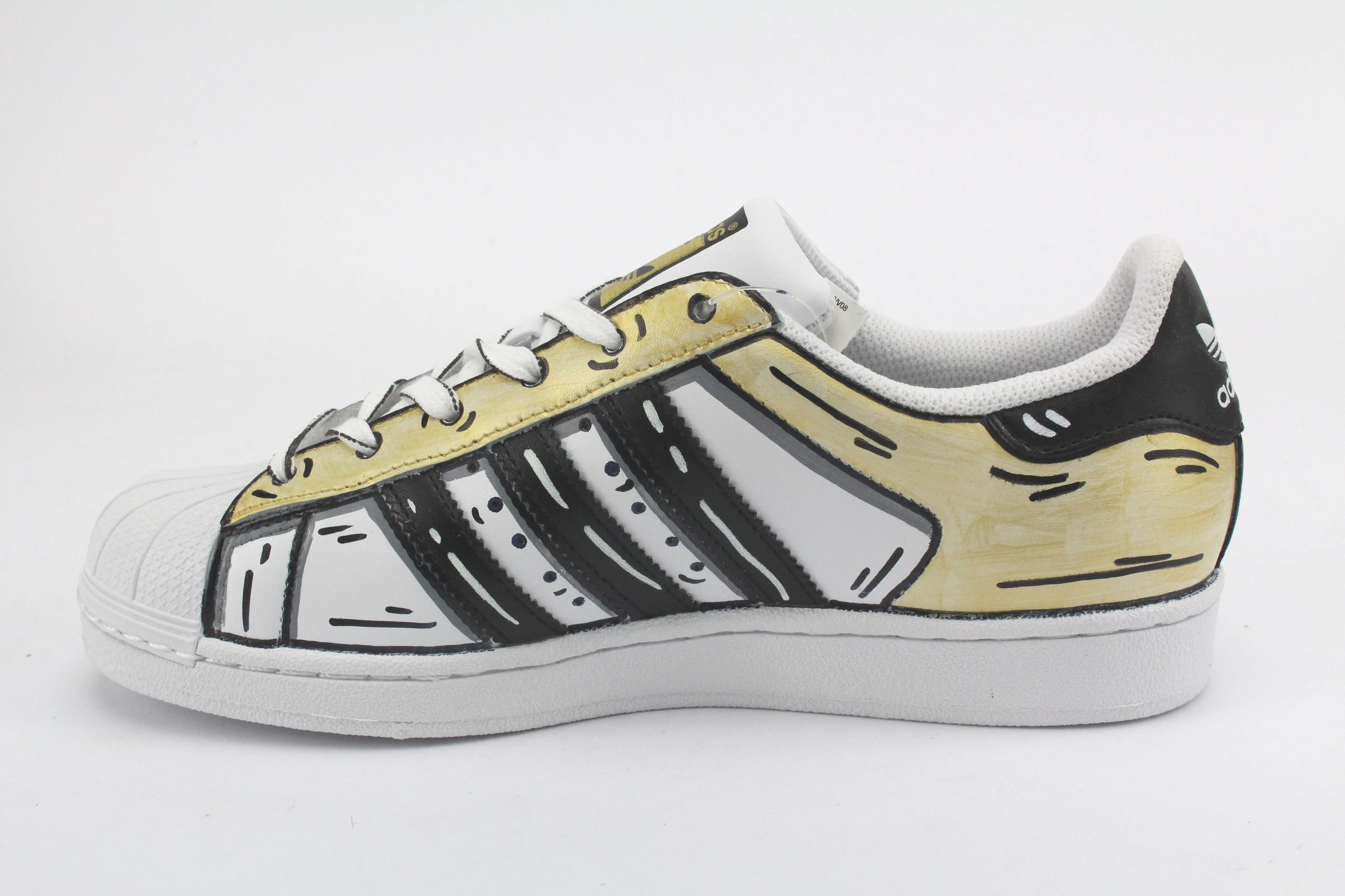 Adidas Superstar Cartoon Gold e lacci cartoon Tidy look Retro Style