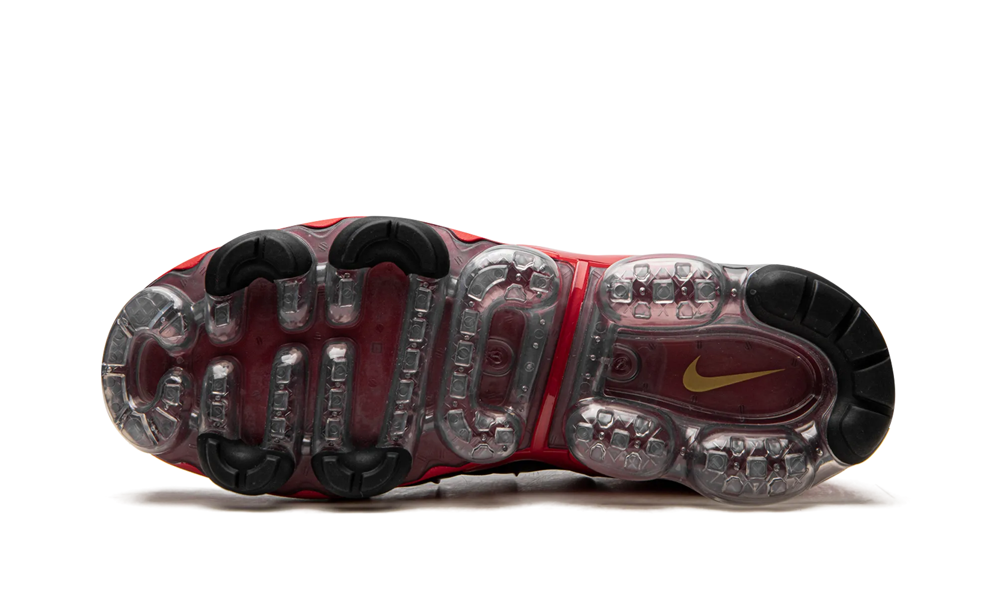 running in a nature reserve grass - surface running shoes Air VaporMax Plus "Stained Glass"