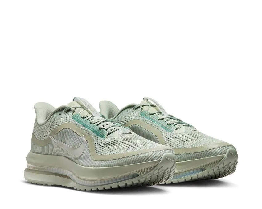 Nike Pegasus Premium "Jade Horizon" running in a monorail station area shoes youth sizes