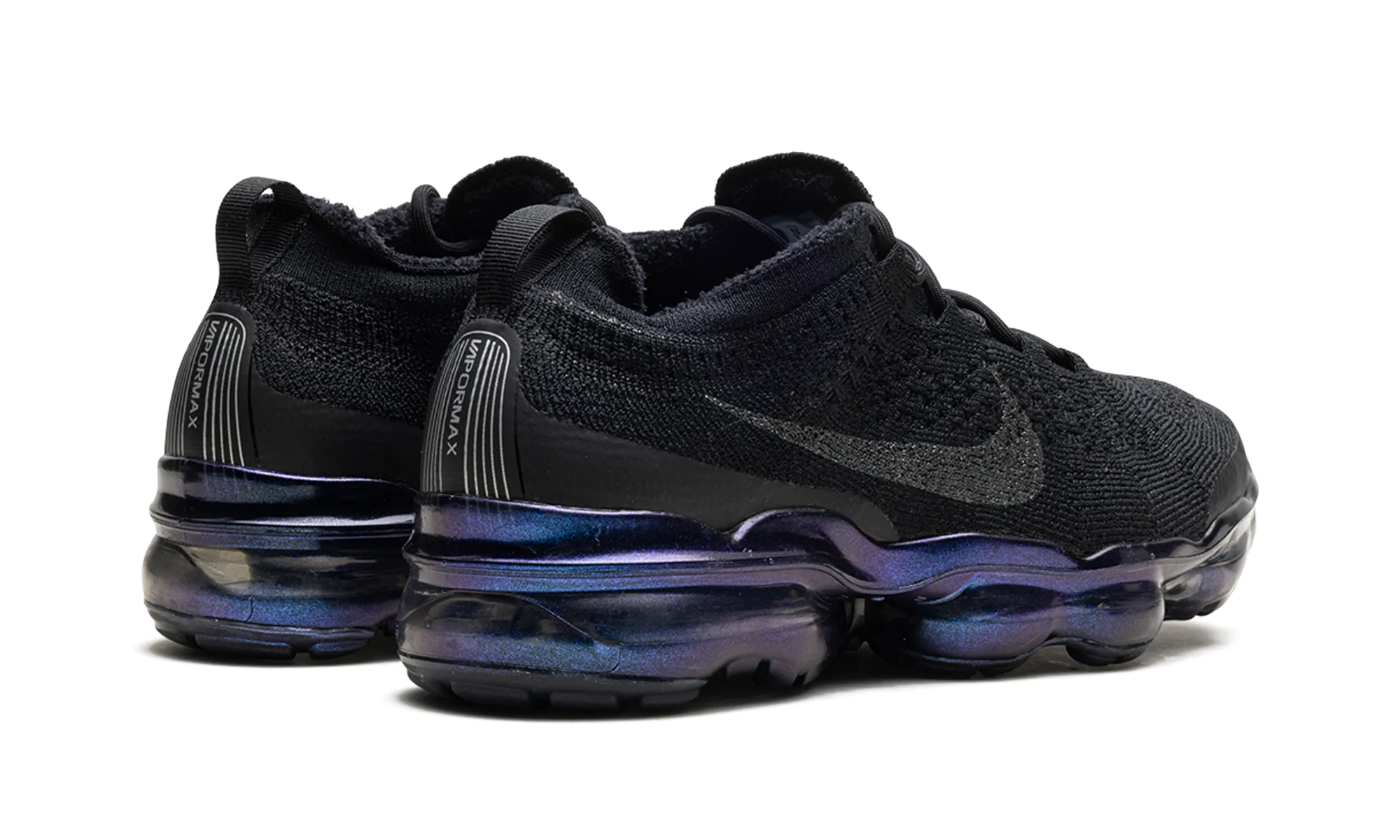 VAPORMAX 2023 FLYKNIT WMNS "Black Iridescent" running in a truss bridge area shoes