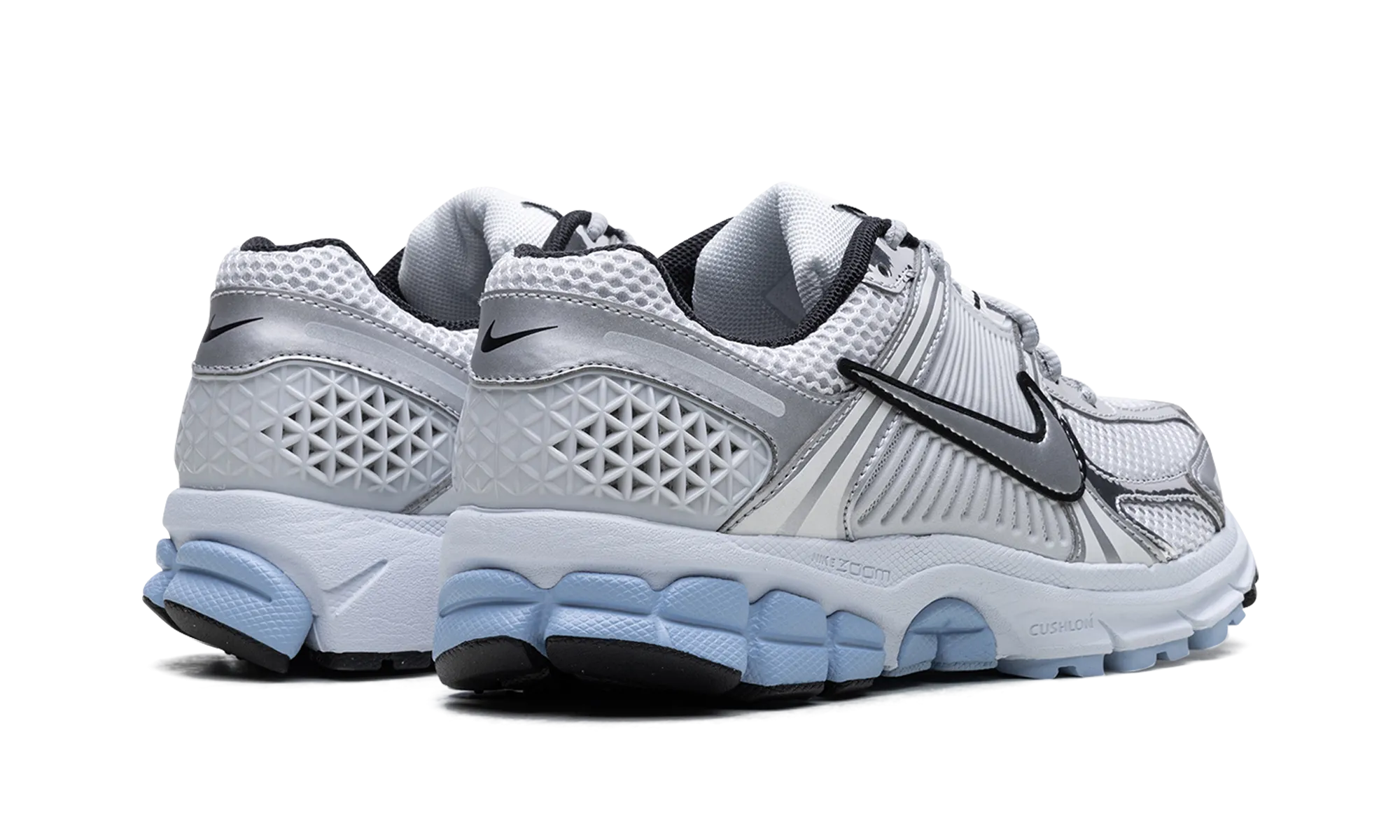 Air Zoom Vomero 5 WMNS "'Metallic Silver Blue Tint'" running in a bus station area shoes