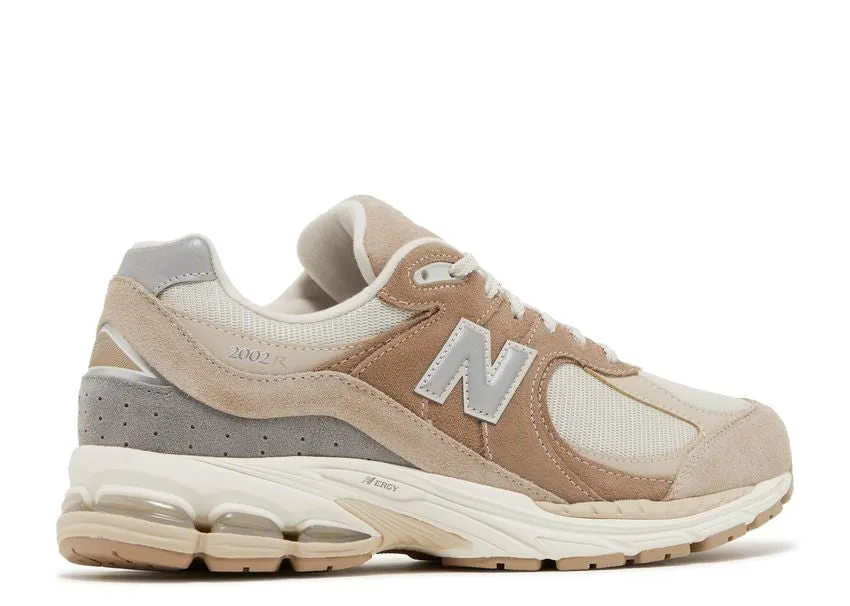 New Balance 2002R Driftwood Sandstone Child Pace Trendy Daily