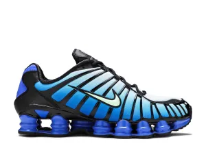 running in a dune area shoes Grass Nike Shox TL Vapor Green Racer Blue
