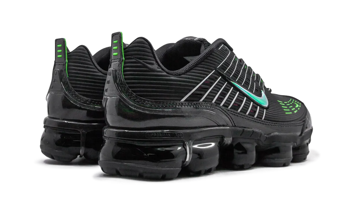 Air Vapormax 360 national - team - themed running gear running in a cantilever bridge area shoes