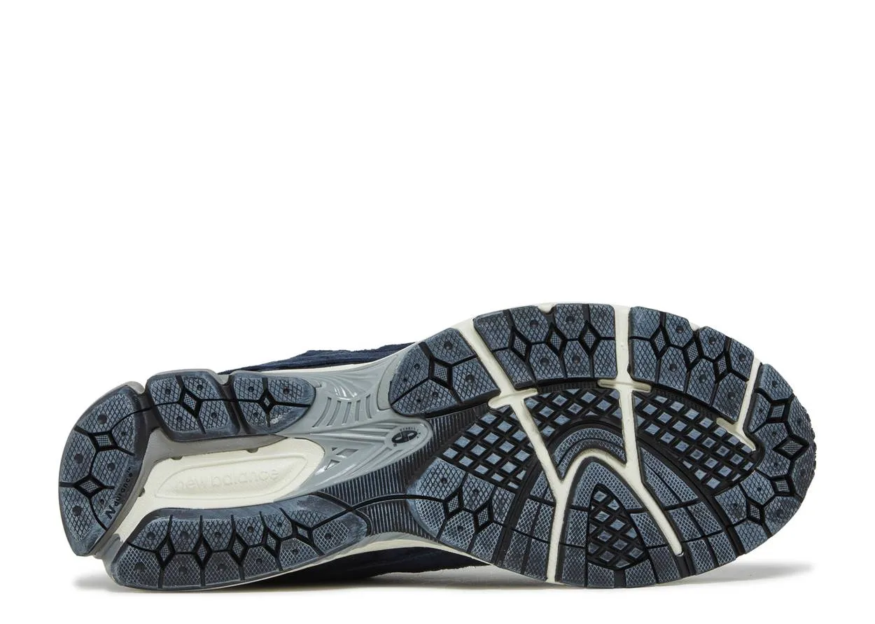 New Balance 2002R Protection Pack Dark Navy Canvas Soft Campus Pace