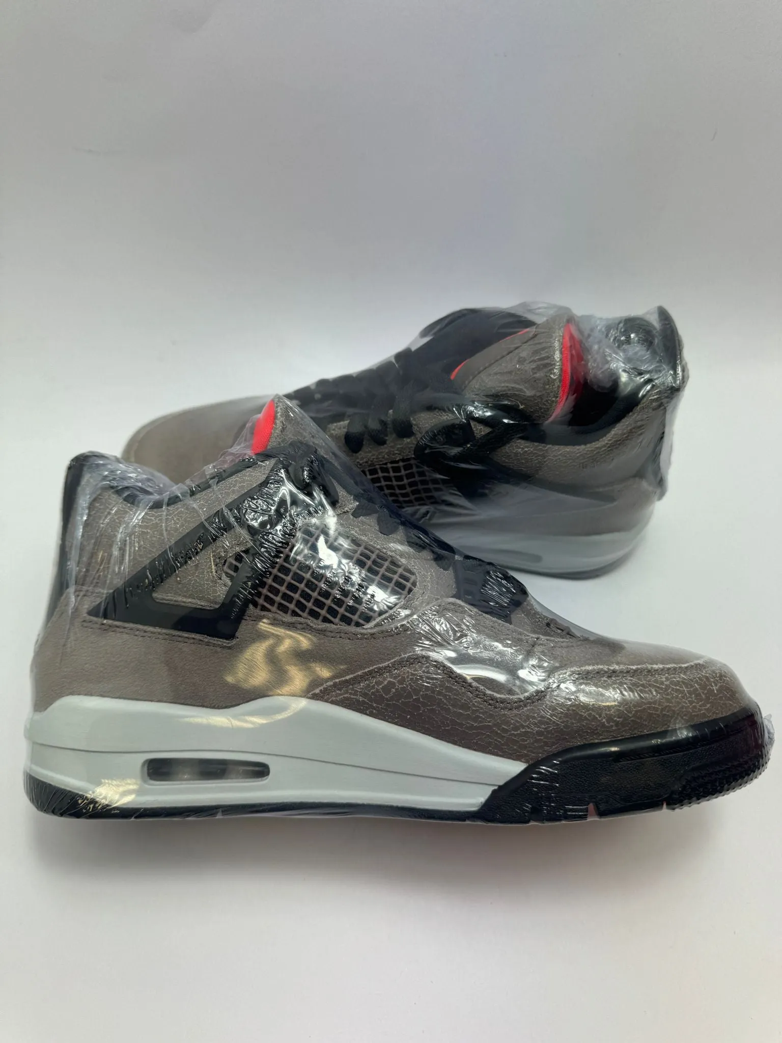 Jordan 4 Retro "Taupe Haze" Suede Warm